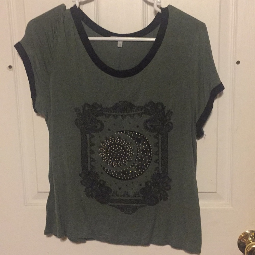 Green shirt with gems as moon